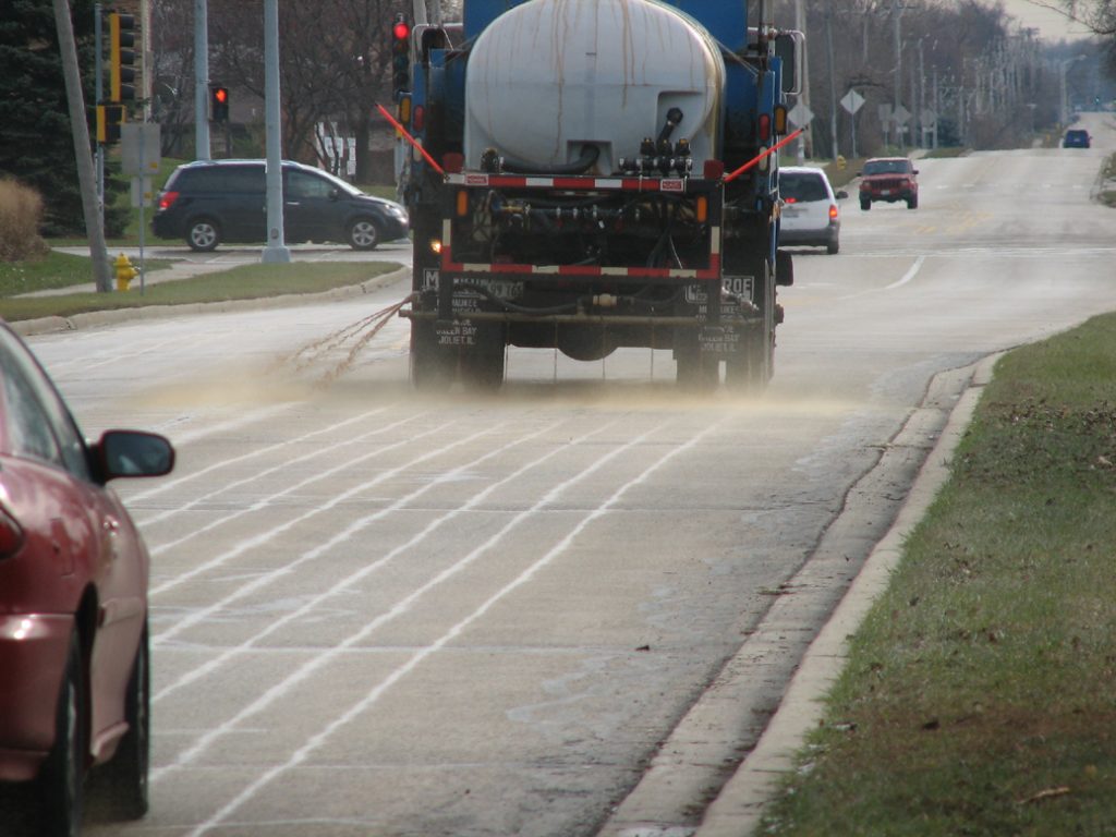 Truck spraying antiicing chemical